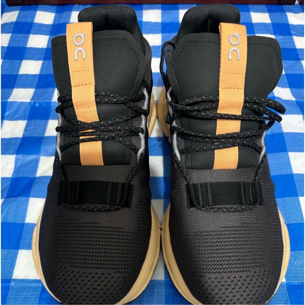 On Running Black and Tan Athletic Shoes